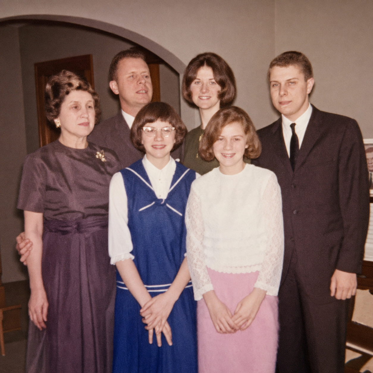 Restored family portrait of Mario and Jane with their children